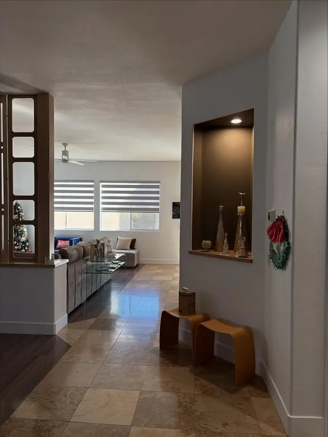 Hallway view of the entry niche and the divider beyond